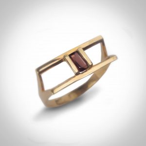 Ally Ring - The design of the ring comes from the architecture world. The clean lines make room for the presence of the beautiful  Ruby stone