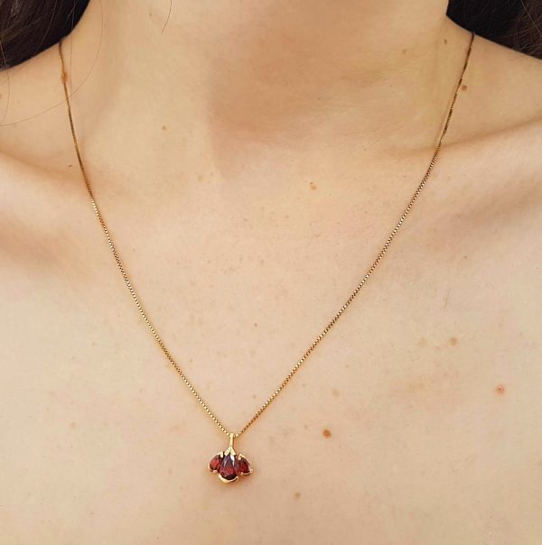 Mika necklace - a 14k gold Pendant with 3 pear shaped garnet stones and a gold necklace