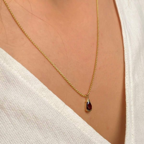 Jane necklace - A 14k gold Pendant with pear shaped garnet stone and a gold necklace