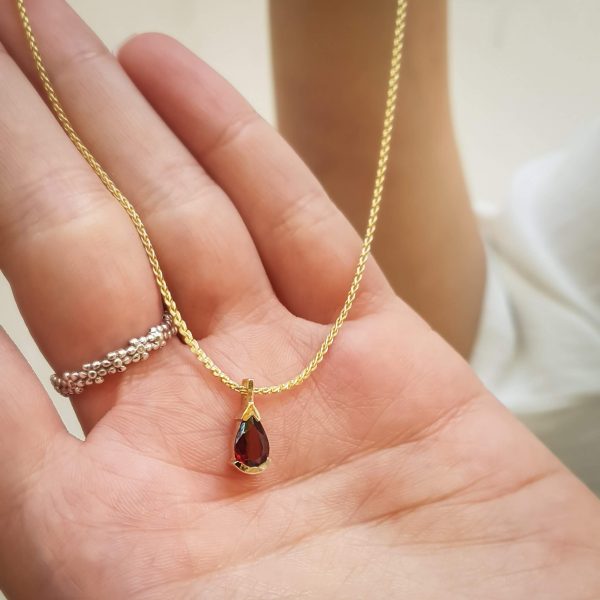 Jane necklace - A 14k gold Pendant with pear shaped garnet stone and a gold necklace