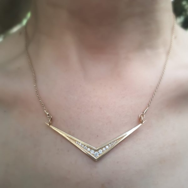 Grace necklace - A v shaped 14k gold Pendant set with 15 diamonds and a gold necklace